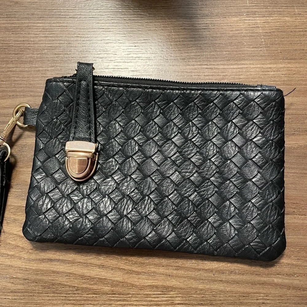 Small Black Pattern Wristlet With Zipper & Metal Clasp Closure.